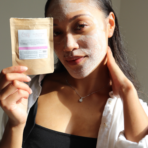 Our beauty friend, Mim, showing us how she applied our 2 minute face mask & exfoliant whilst holding our refillable skincare product face mask & exfoliant in her hand.